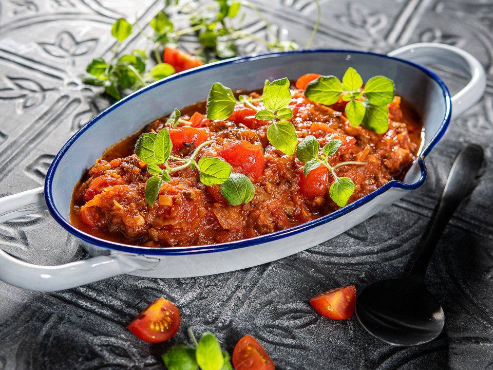Bild zum Rezept: Spitzkohl in Tomatensugo