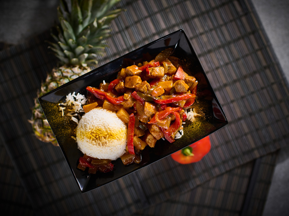 Bild zum Rezept: Schweinegeschnetzeltes in Paprika-Ananas-Soße